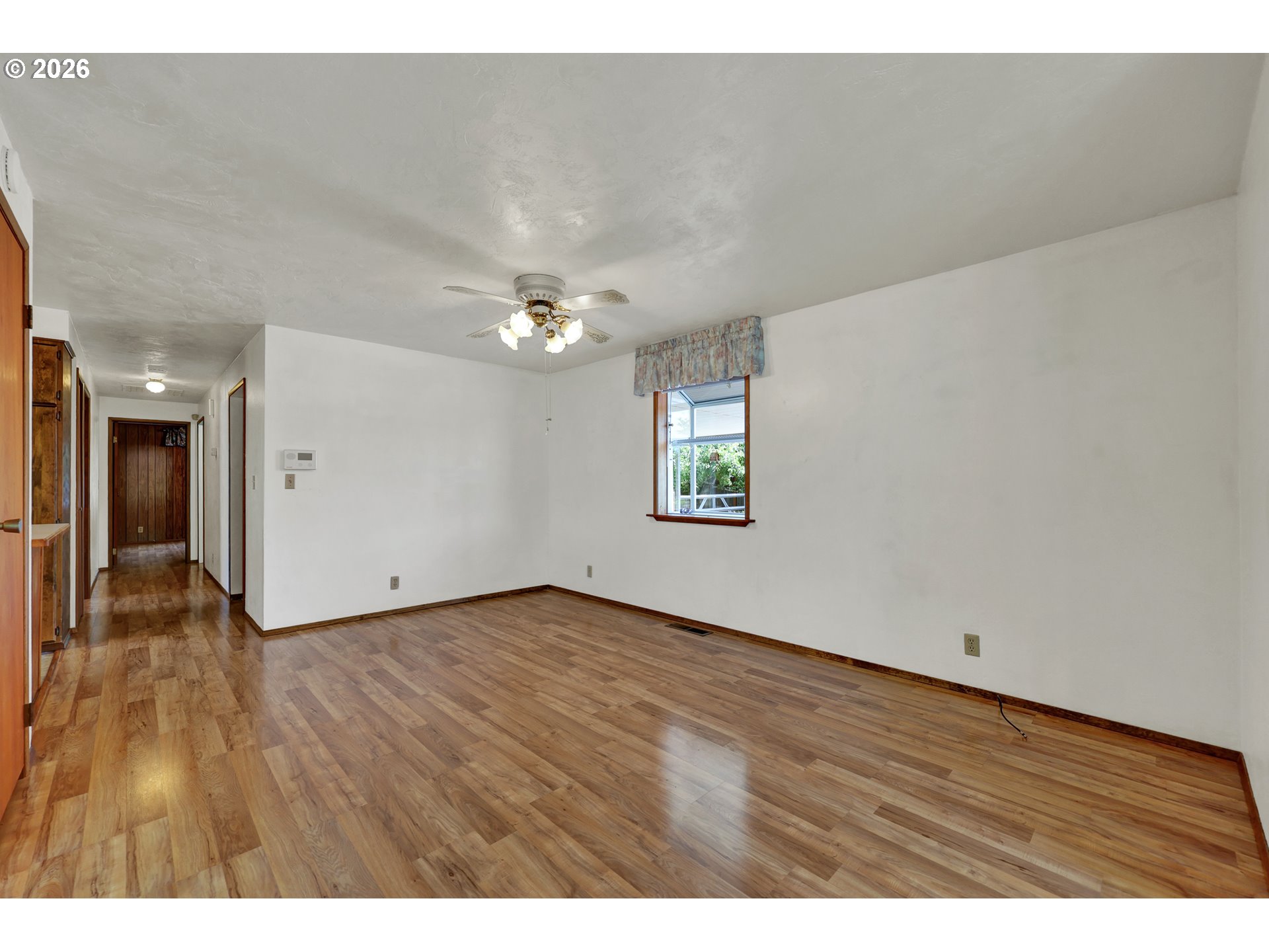 1425 Taney Street Eugene, OR 97402 - Photo 7 of 34 a view of an empty room with wooden floor