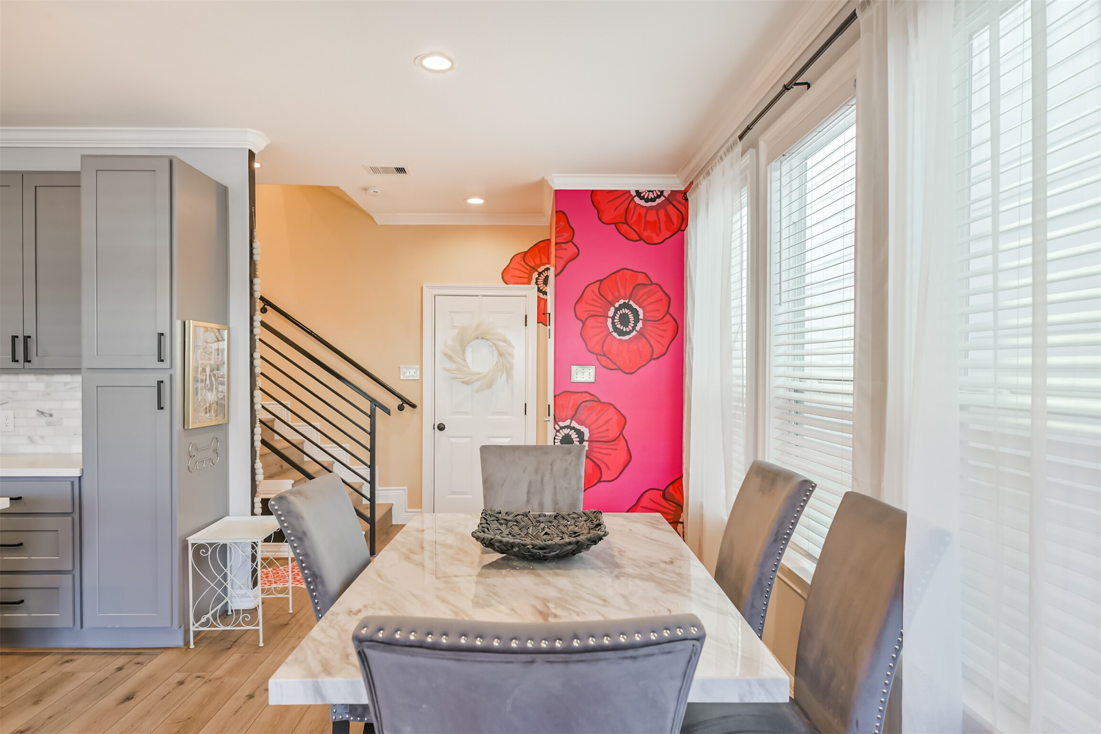 1010 Melneeka Lane Houston, TX 77091 - Photo 13 of 37 Share meals with loved ones in the 6 seater dining room table. (6th chair can be found in the primary bedroom).