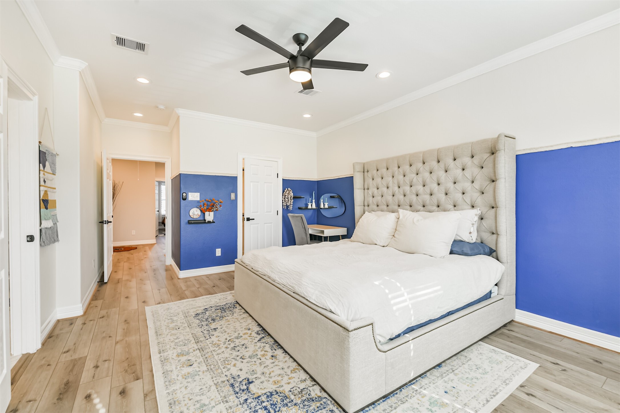 1010 Melneeka Lane Houston, TX 77091 - Photo 27 of 37 Traveling down the hallway you will enter the primary suite.