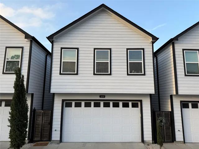 a kitchen with a table and a couch