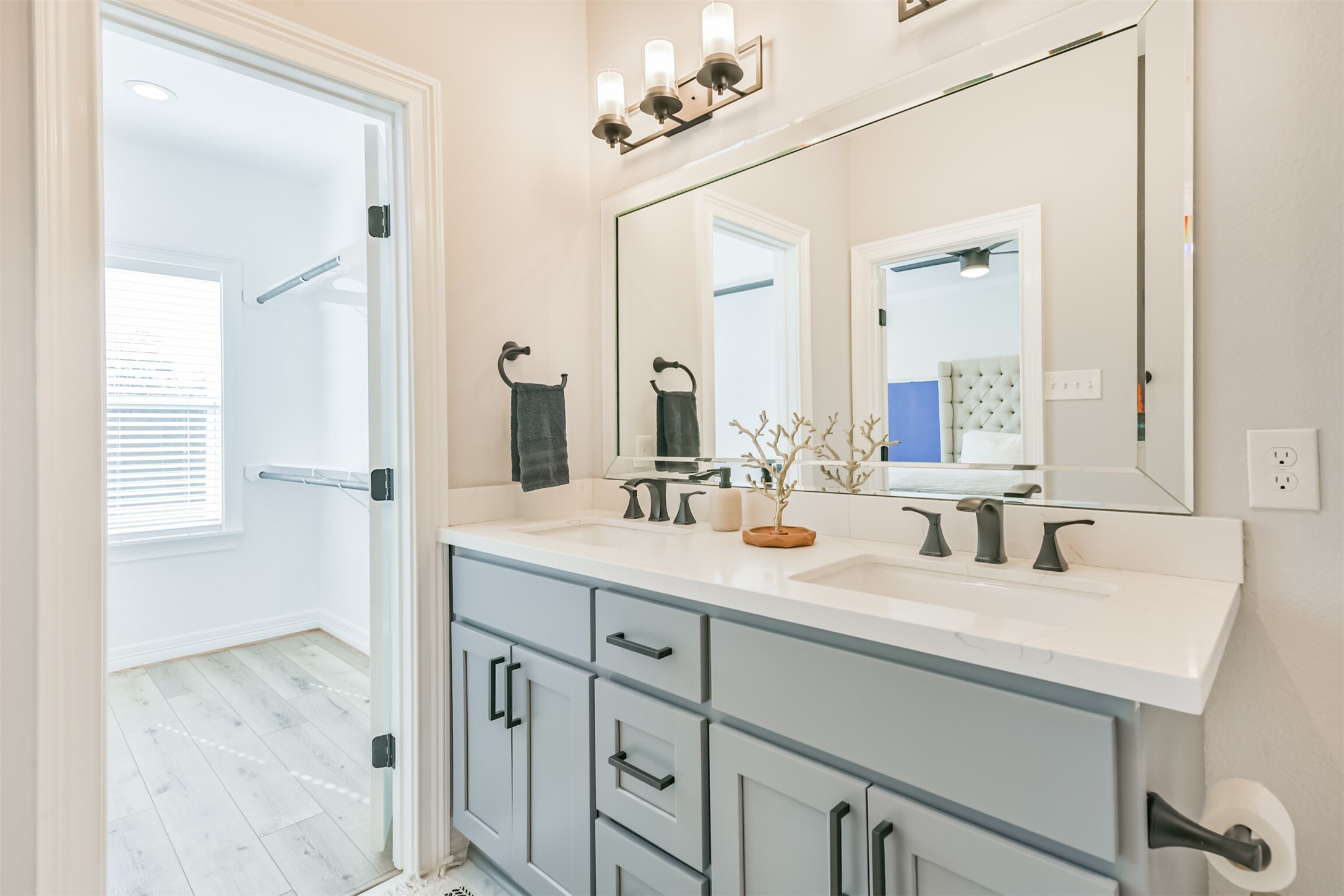1010 Melneeka Lane Houston, TX 77091 - Photo 34 of 39 a bathroom with a double vanity sink and a mirror