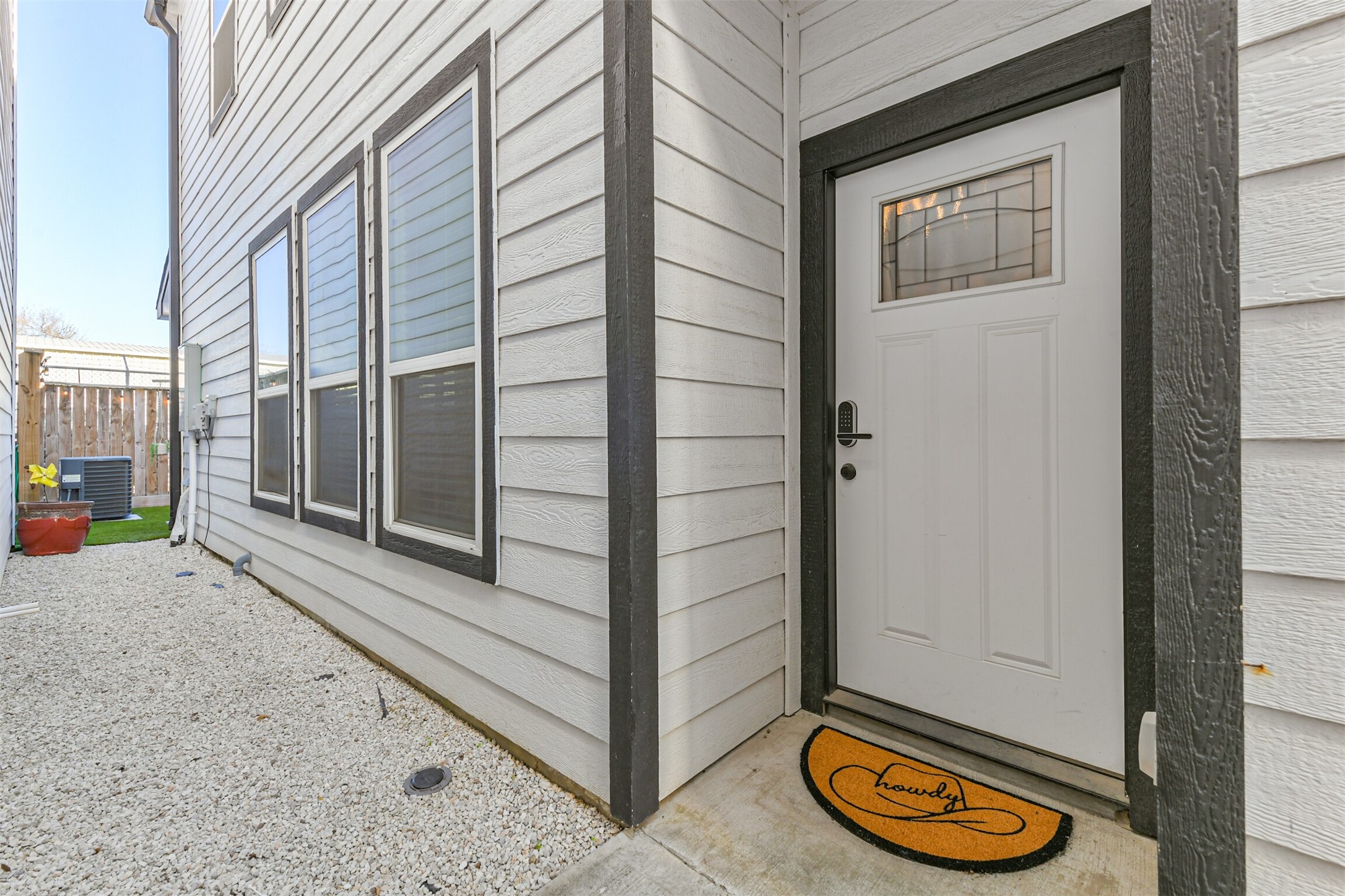 1010 Melneeka Lane Houston, TX 77091 - Photo 4 of 39 Front door is equipped with a keypad for keyless entry.