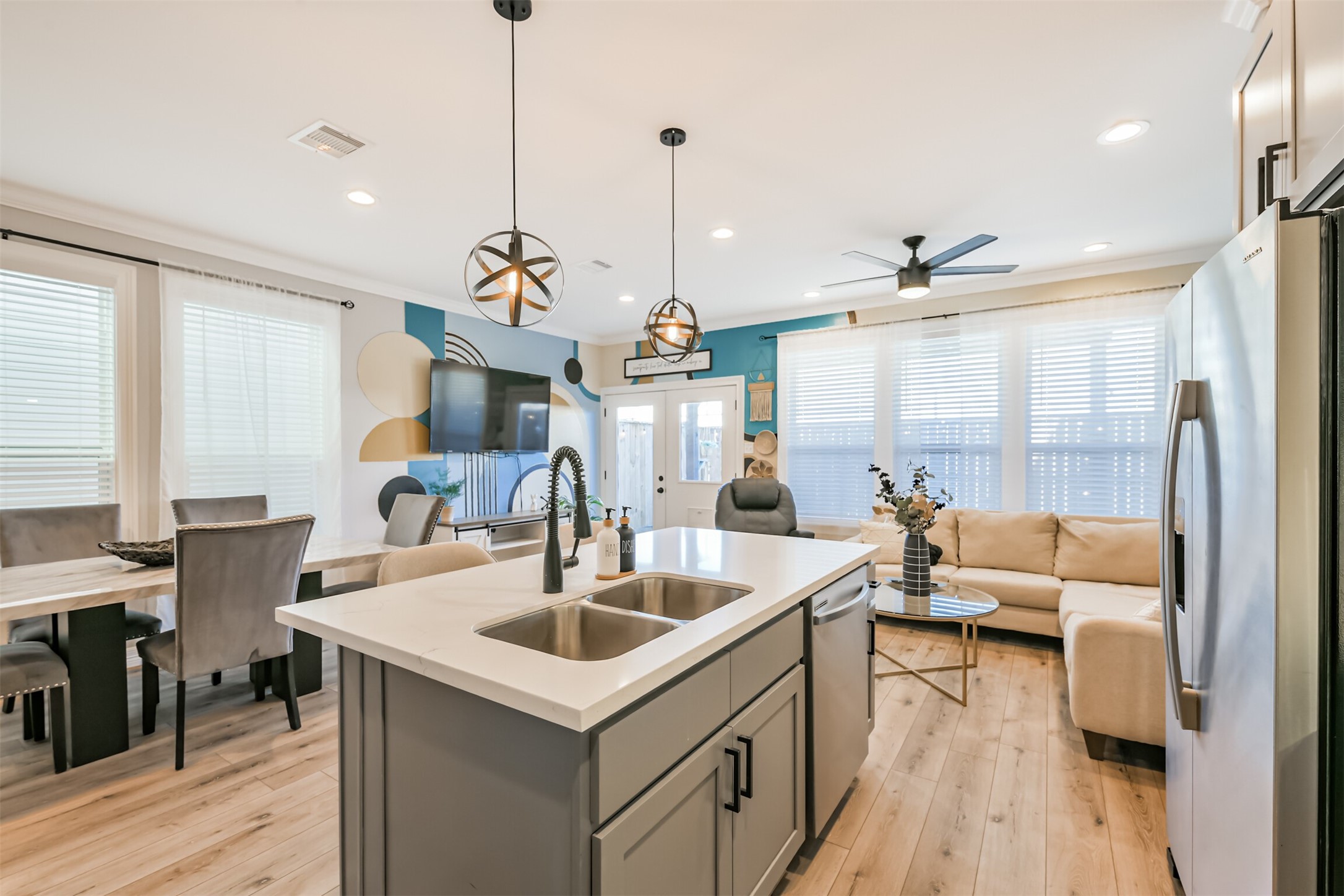 1010 Melneeka Lane Houston, TX 77091 - Photo 10 of 37 The kitchen opens up to the dining room and living room.