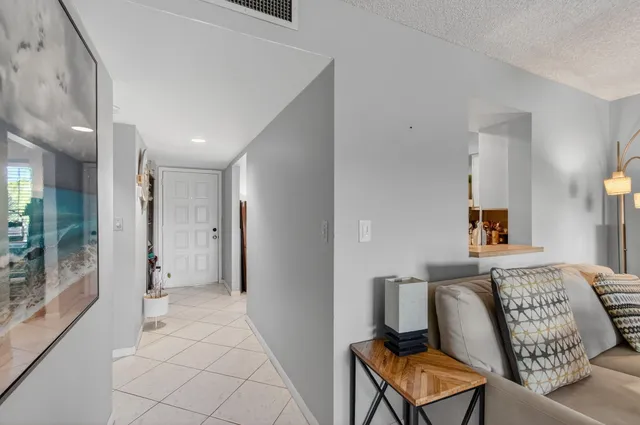 a kitchen with cabinets and stainless steel appliances