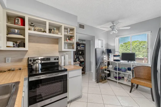 a white toilet sitting next to a bath tub