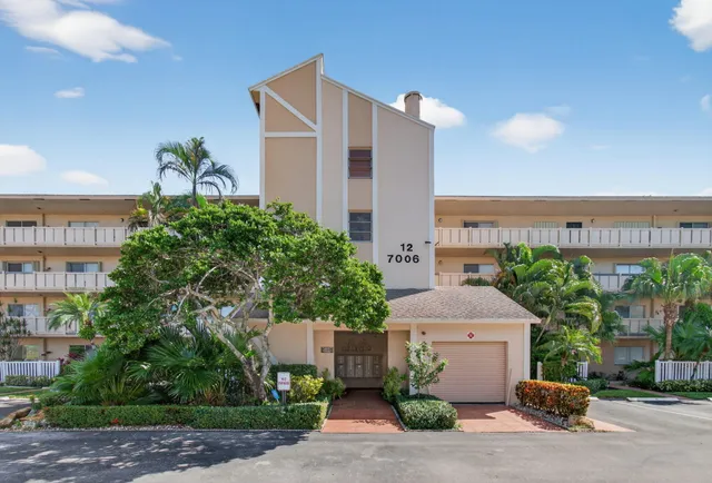 a front view of a building with street view