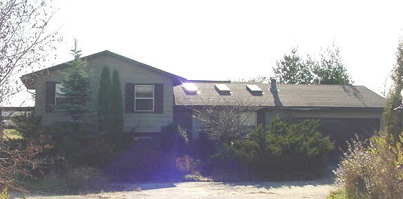1922 Fischer Road South Beloit, IL 61080 - Photo 1 of 4 a view of a house with a yard