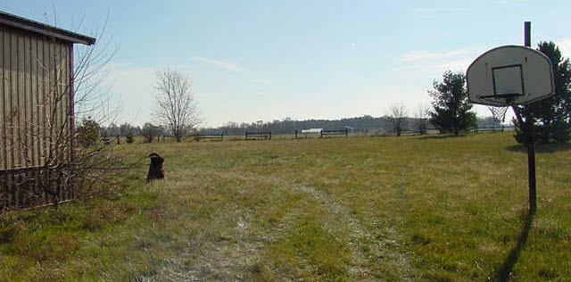 1922 Fischer Road South Beloit, IL 61080 - Photo 3 of 4 a view of a lake with a yard