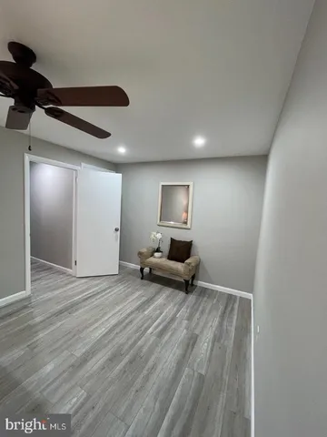 a view of livingroom with furniture and wooden floor