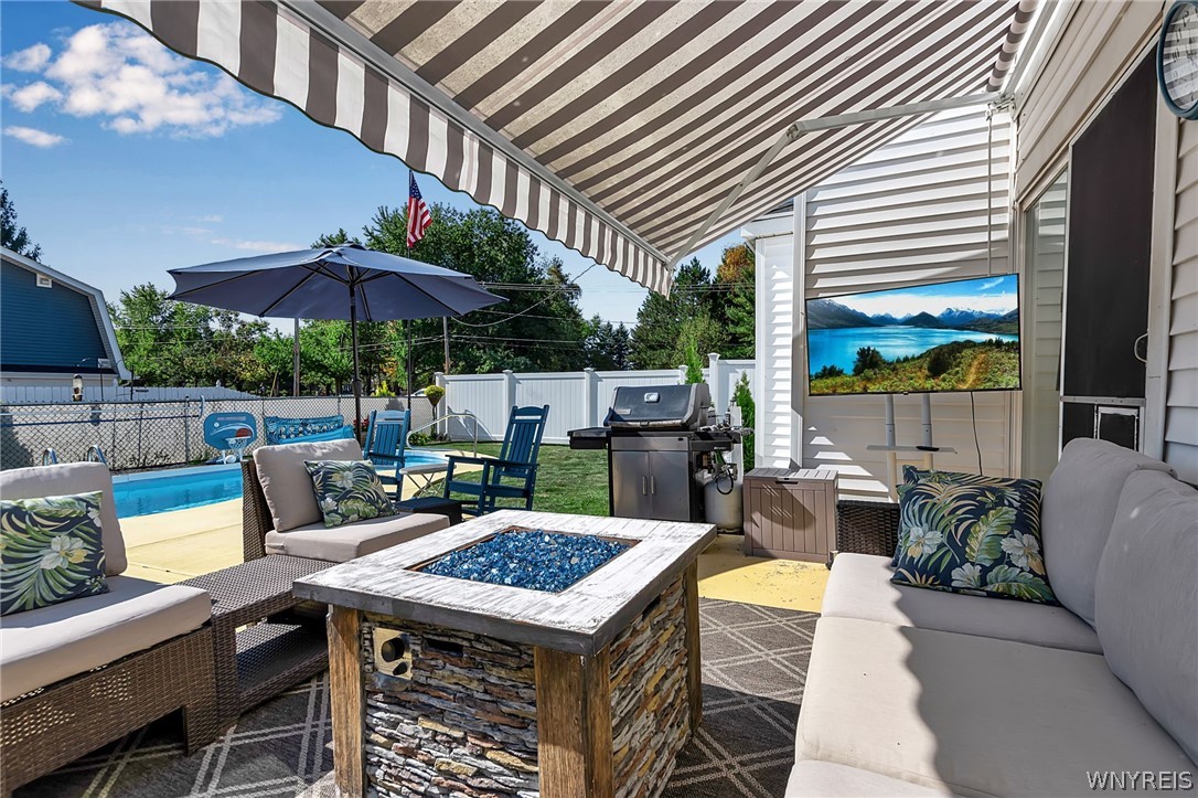 6889 Sand Hill Road Newstead, NY 14001 - Photo 35 of 50 Patio with retractable awning