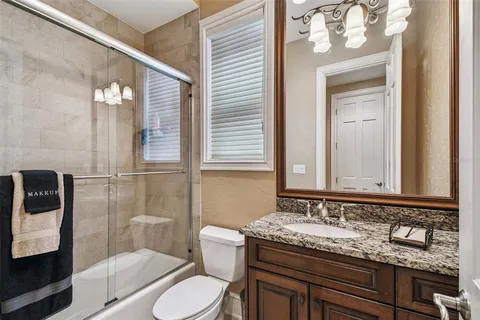 a view of a patio with a table chairs and a patio