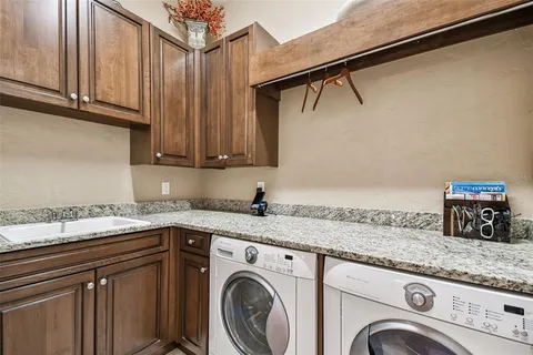 a view of a balcony with furniture