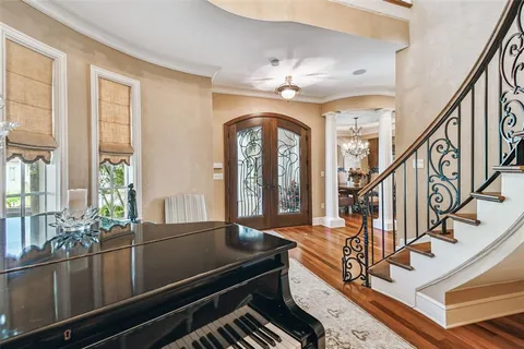 an aerial view of houses with outdoor space
