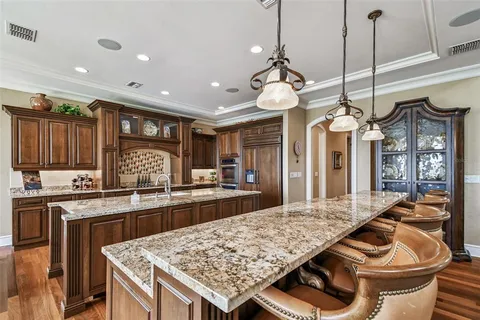 a bath tub sitting next to a bathroom sink