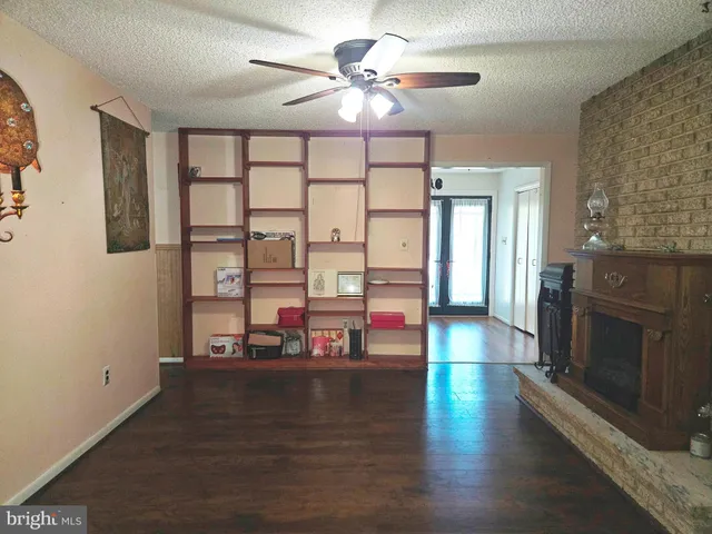 a view of a chair and table on the deck
