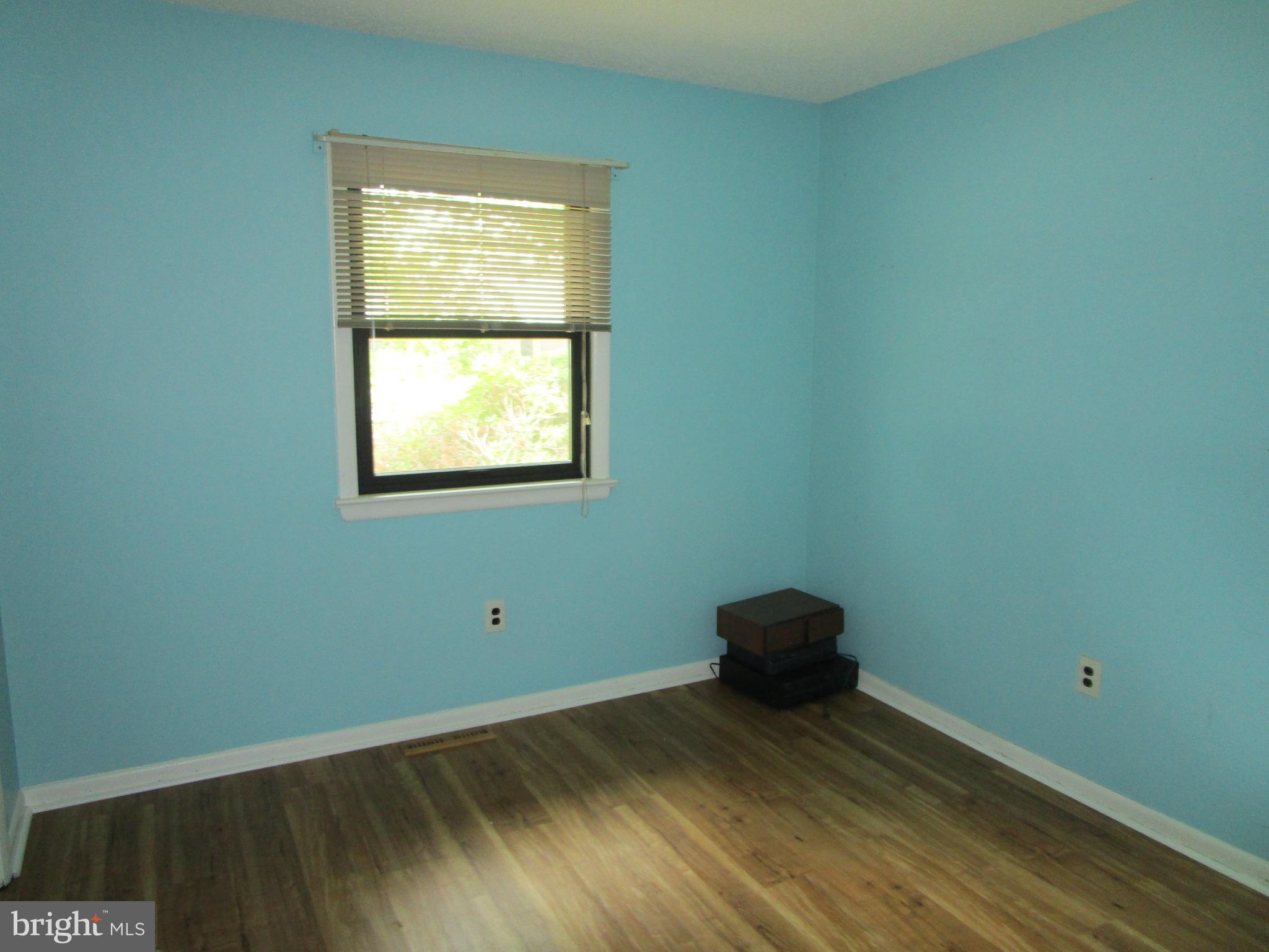 0 Maple Avenue Waterford Works, NJ 08089 - Photo 38 of 62 a view of an empty room with wooden floor and a window