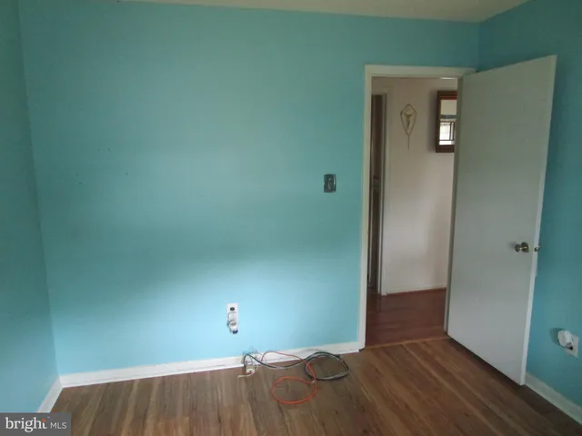 a view of a livingroom with wooden floor