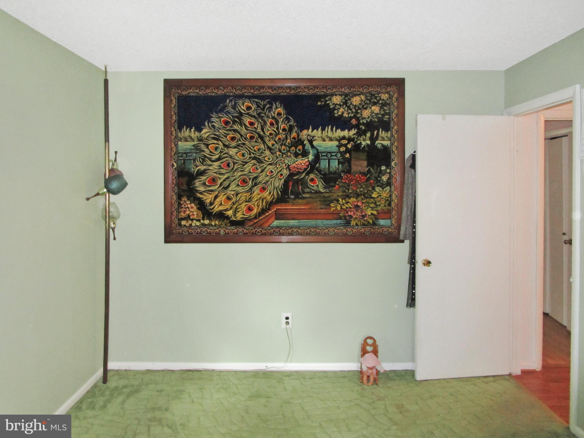 0 Maple Avenue Waterford Works, NJ 08089 - Photo 44 of 62 a view of a hallway with wooden floor and a refrigerator in a kitchen