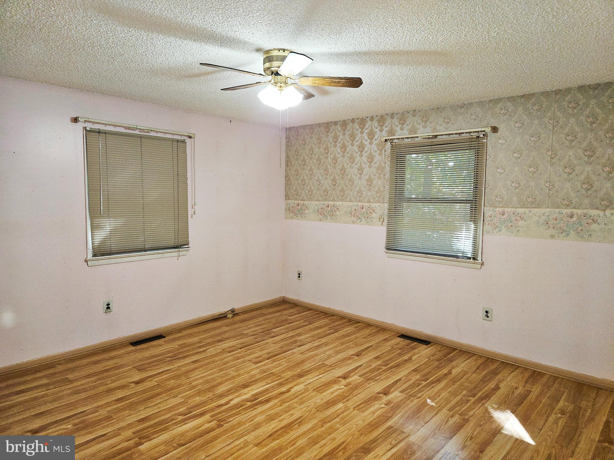 0 Maple Avenue Waterford Works, NJ 08089 - Photo 47 of 62 a view of an empty room with wooden floor and a window