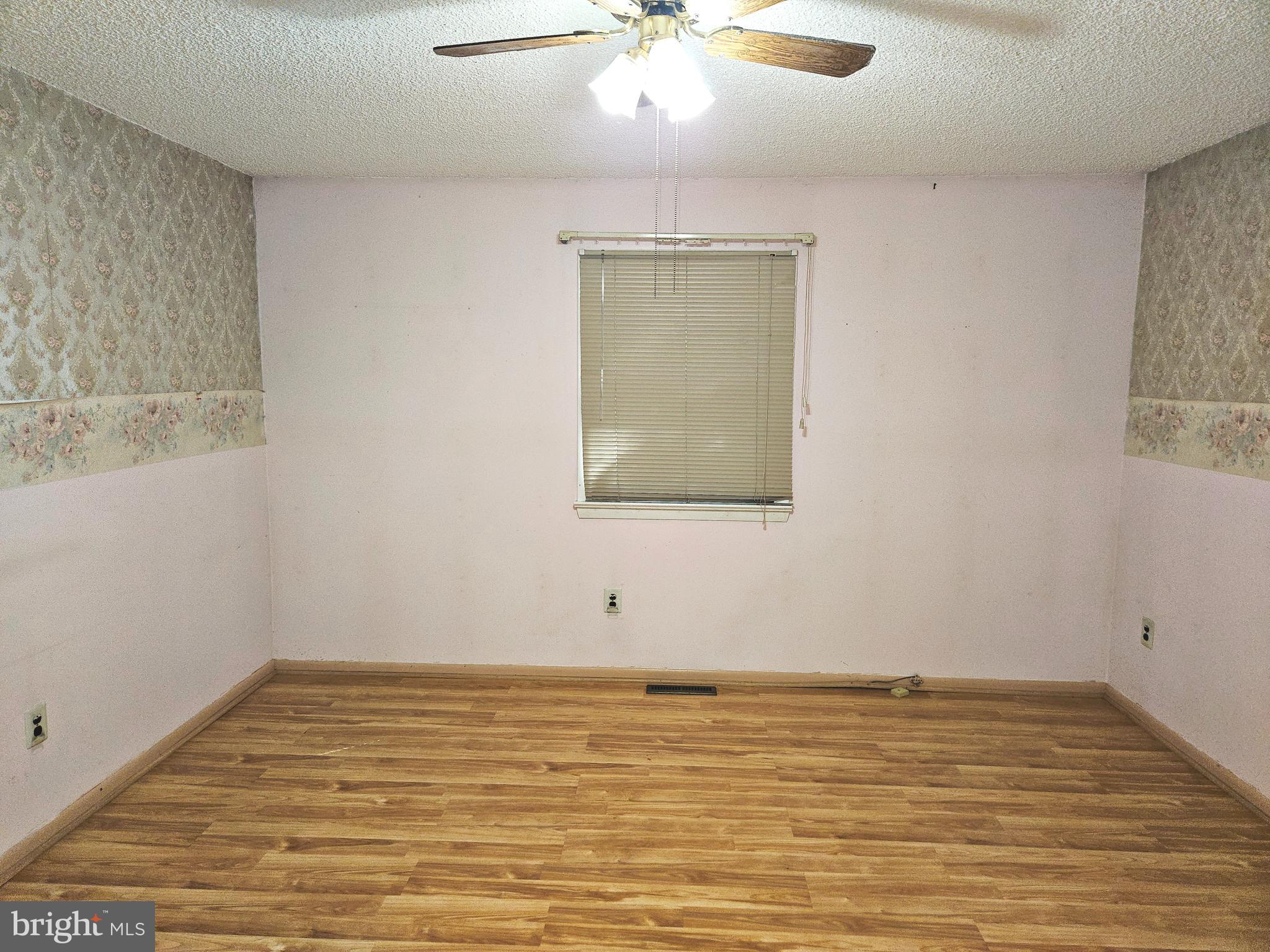0 Maple Avenue Waterford Works, NJ 08089 - Photo 48 of 62 a view of an empty room with window and wooden floor