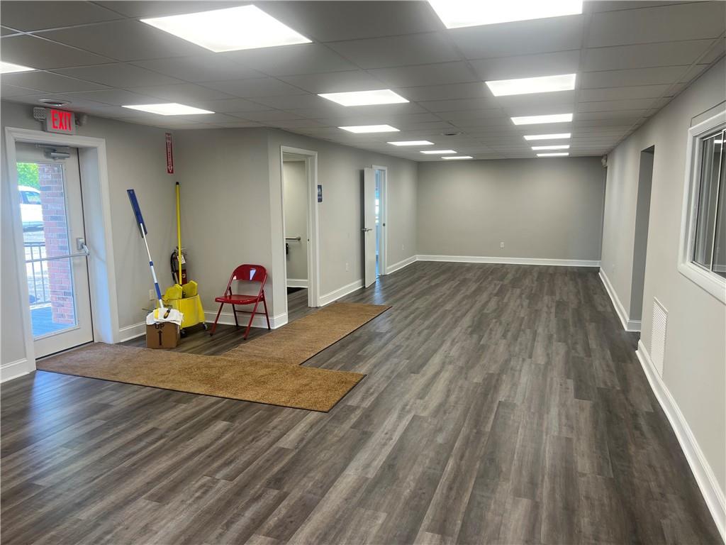 3136 Brodhead Road Aliquippa, PA 15001 - Photo 3 of 8 a view of a room with wooden floor and stairs