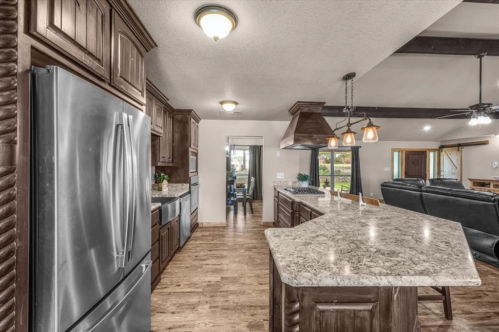 1508 Poolville Cut Off Road Poolville, TX 76487 - Photo 14 of 39 Kitchen with granite countertops