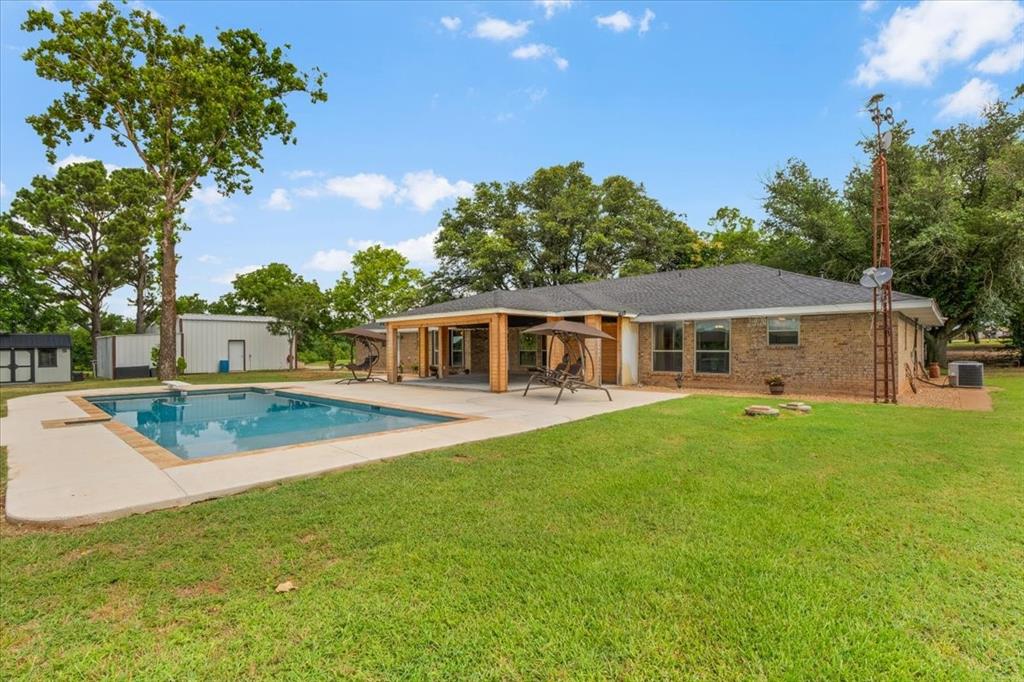 1508 Poolville Cut Off Road Poolville, TX 76487 - Photo 29 of 39 Swimming pool, large, covered patio and shop