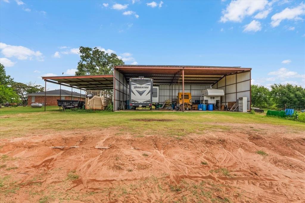 1508 Poolville Cut Off Road Poolville, TX 76487 - Photo 7 of 39 40X50 RV Storage with 20X40 awning and solar panesl