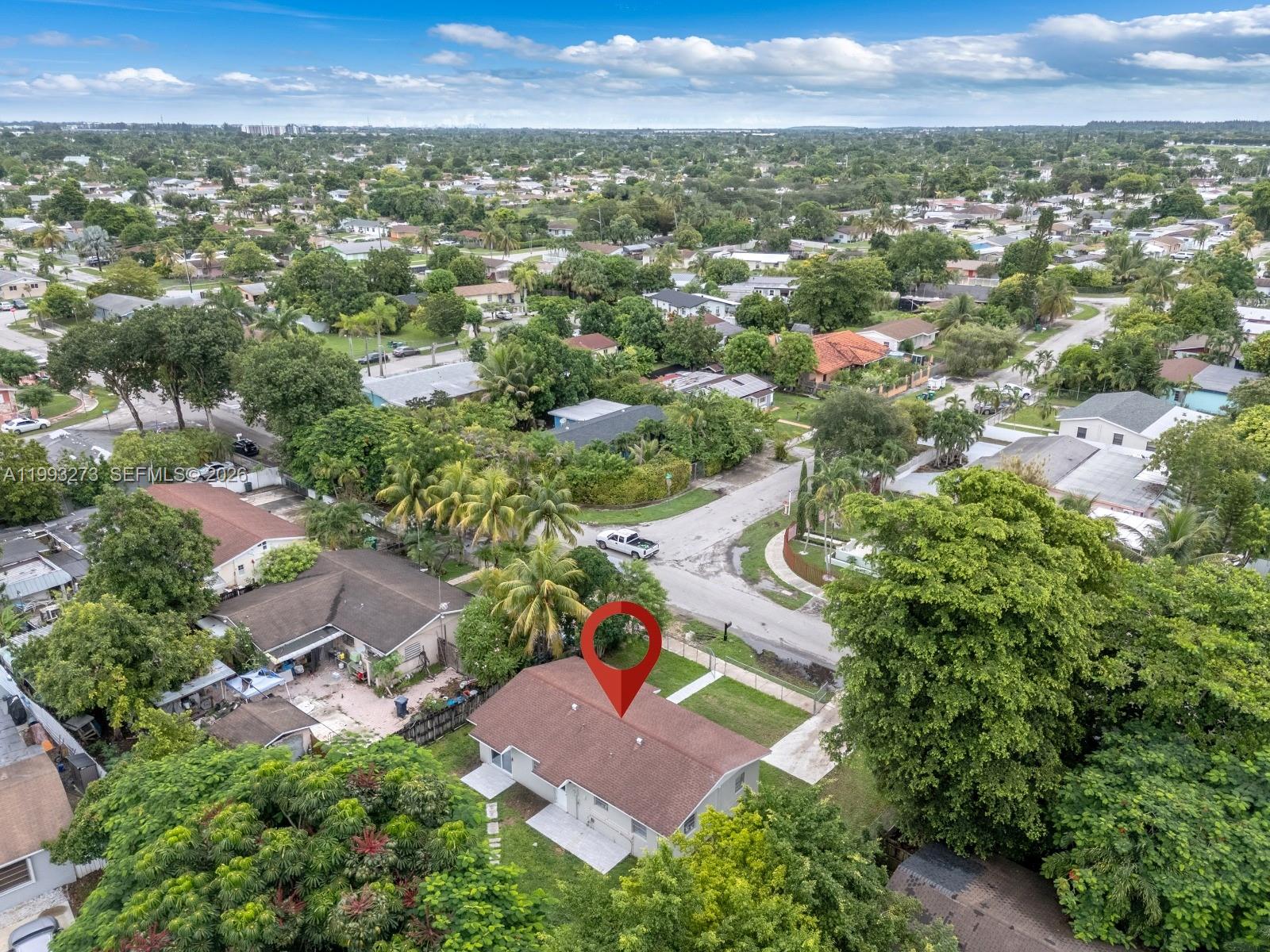 30534 Southwest 155th Court Homestead, FL 33033 - Photo 25 of 33 an aerial view of residential houses with outdoor space and trees