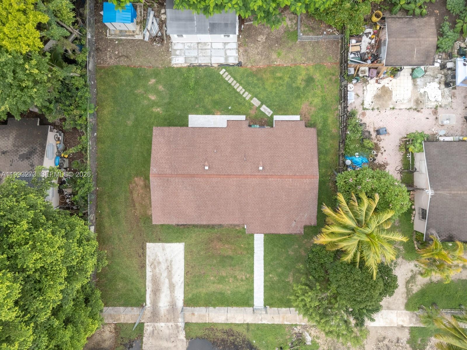 30534 Southwest 155th Court Homestead, FL 33033 - Photo 28 of 33 an aerial view of a house with a yard and a large tree