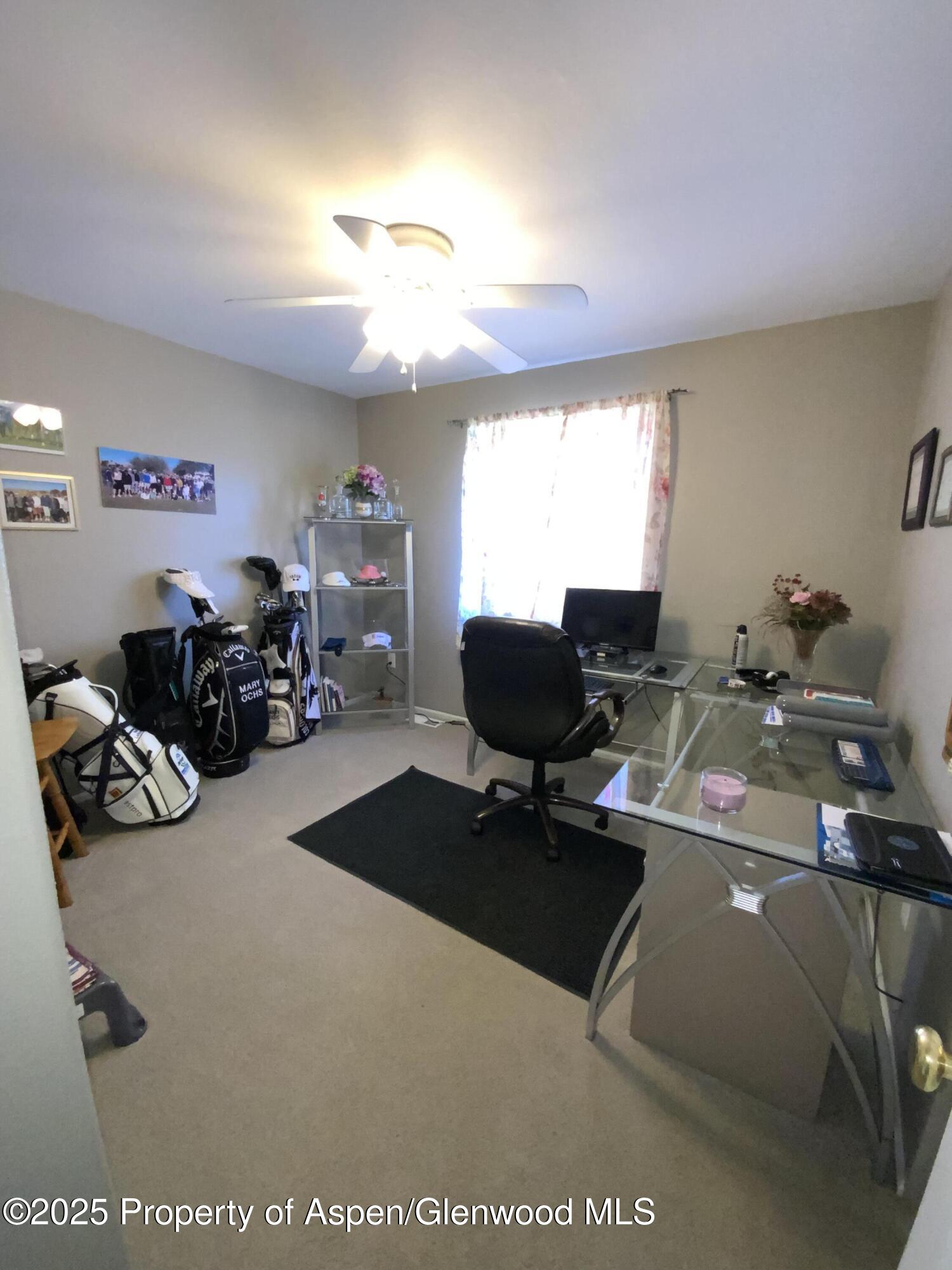 660 Aspen Avenue Rifle, CO 81650 - Photo 14 of 30 a view of a room with gym equipment