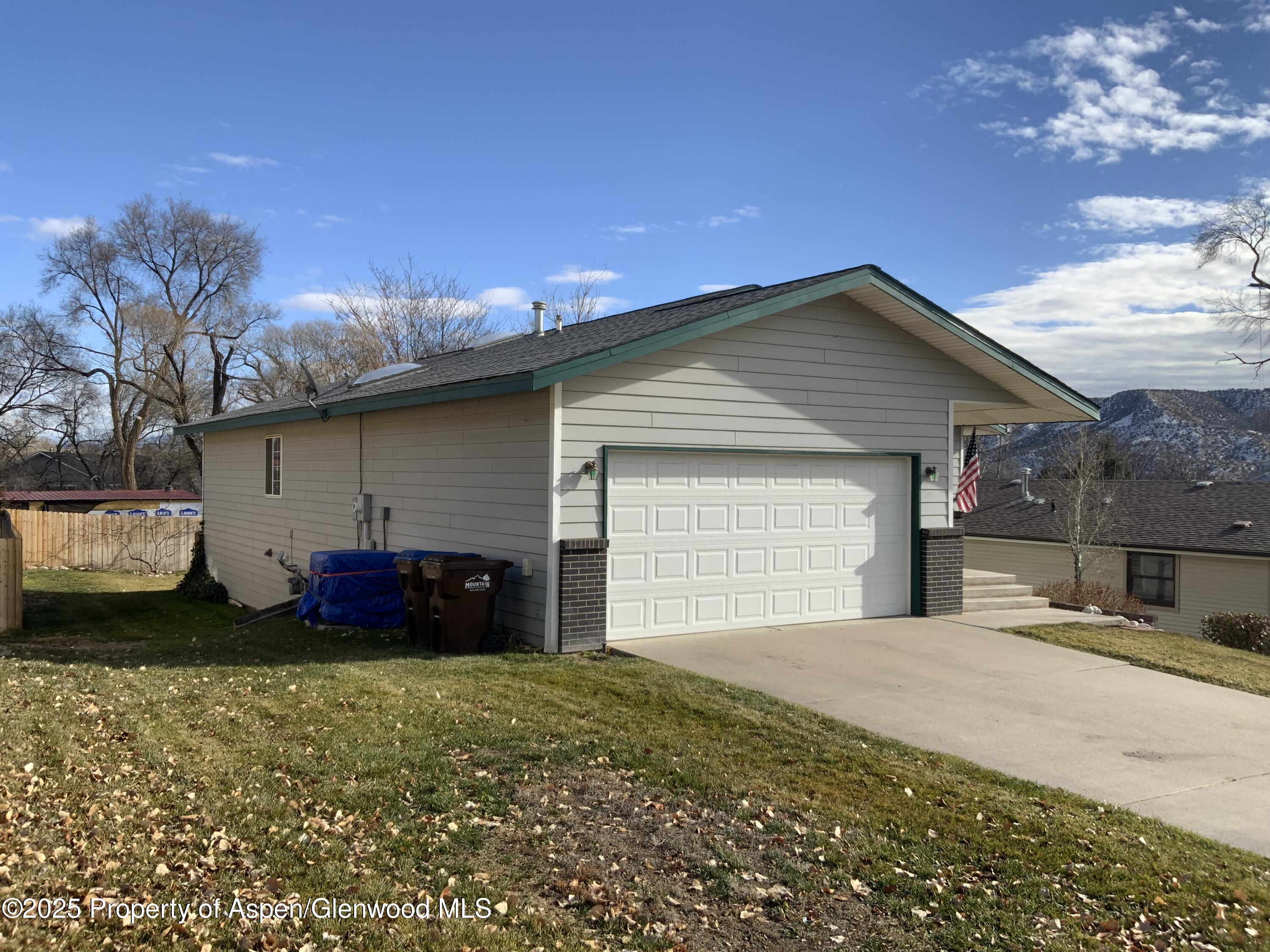 660 Aspen Avenue Rifle, CO 81650 - Photo 27 of 30 a house view with a backyard space