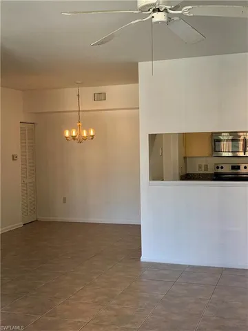 a view of a kitchen with a sink and dishwasher