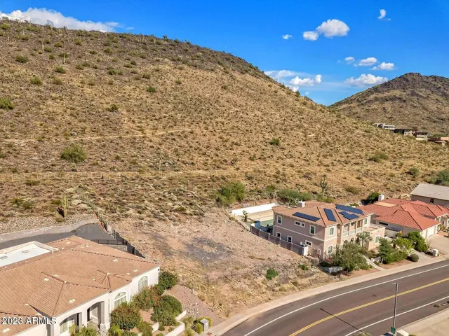 an aerial view of a house with a outdoor space