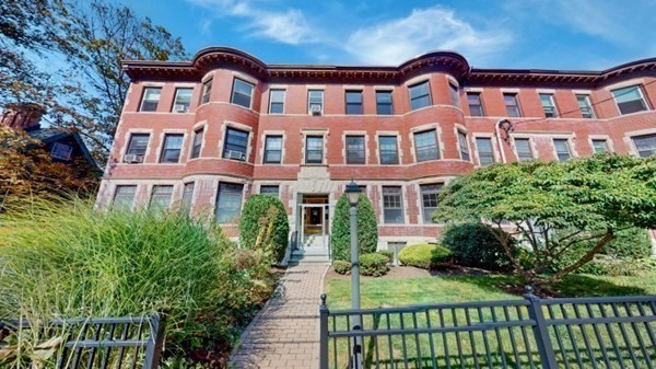 149 Winthrop Road, Unit 2 Brookline, MA 02445 - Photo 1 of 11 a front view of a multi story residential apartment building
