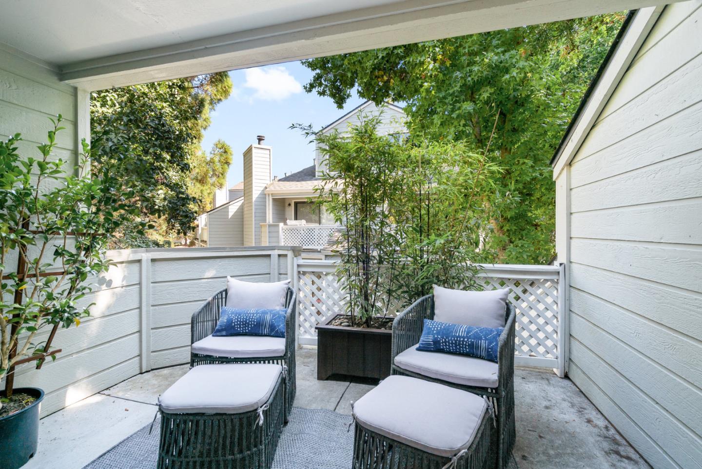 2615 Willowbrook Lane, Unit 82 Aptos, CA 95003 - Photo 7 of 27 a balcony with furniture and a potted plant