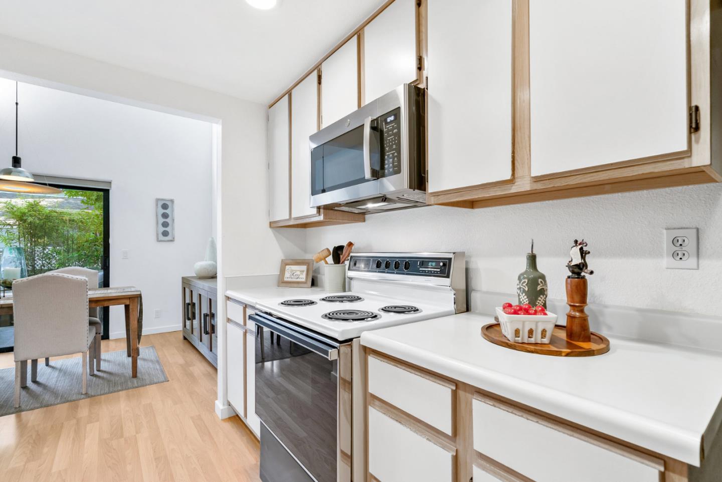 2615 Willowbrook Lane, Unit 82 Aptos, CA 95003 - Photo 9 of 27 a kitchen with stainless steel appliances a stove a sink and cabinets