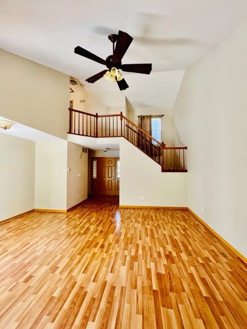716 Sutton Circle Wheeling, IL 60090 - Photo 24 of 38 a view of a room with wooden floor