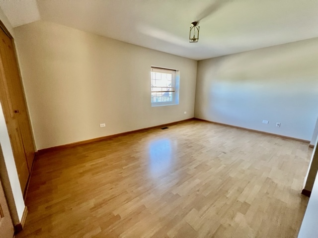 716 Sutton Circle Wheeling, IL 60090 - Photo 32 of 38 an empty room with a window