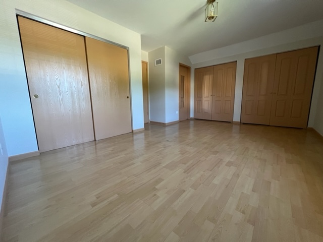 716 Sutton Circle Wheeling, IL 60090 - Photo 34 of 38 a view of an empty room with closet area