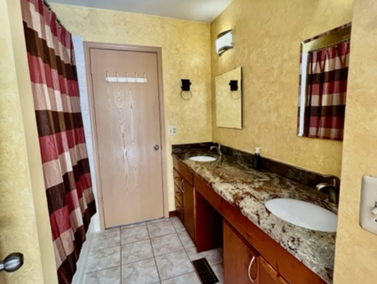716 Sutton Circle Wheeling, IL 60090 - Photo 38 of 38 a bathroom with a granite countertop sink and a mirror