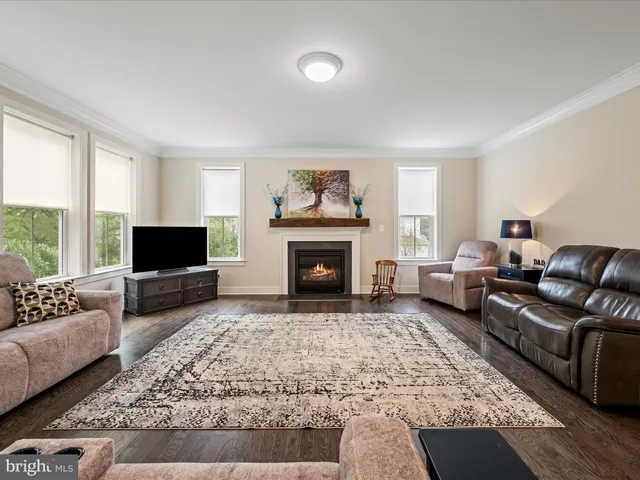 a workspace with furniture and a window