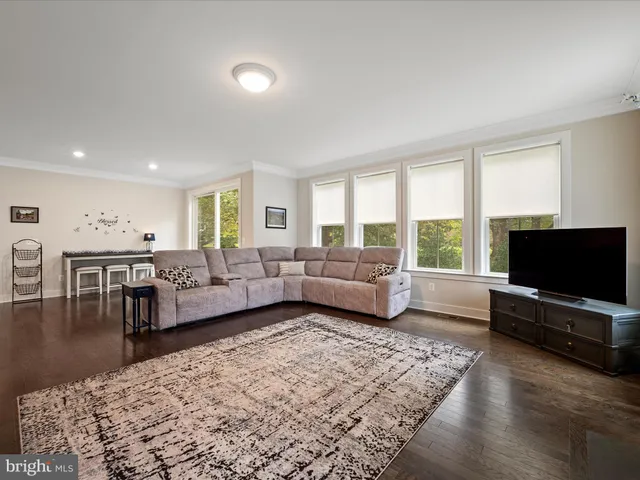 a room with furniture and musical instruments