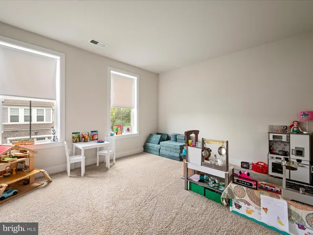 a bathroom with a sink a mirror and a bathtub