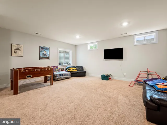 an aerial view of a house with a garden