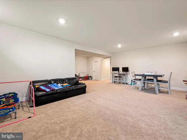 an aerial view of a house with outdoor space