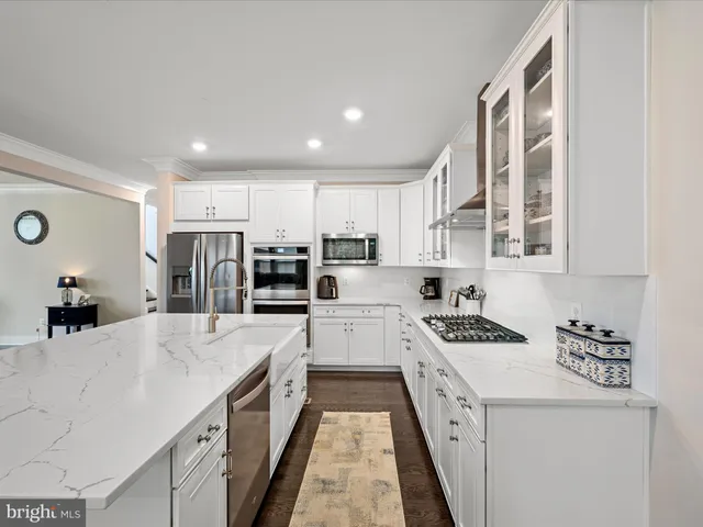 a kitchen with a stove and a cabinet