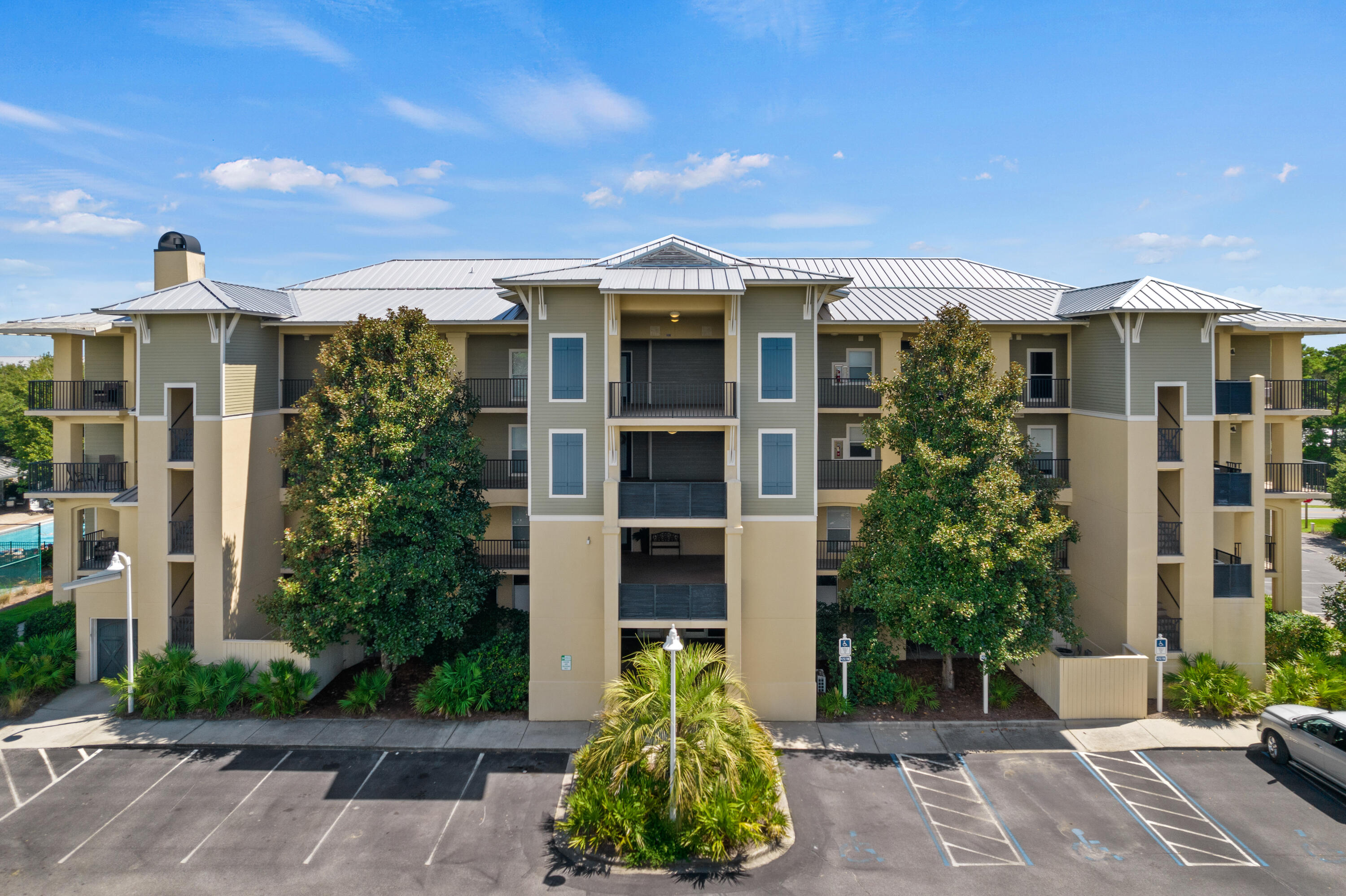 1732 West County Highway 30A, Unit 403R Santa Rosa Beach, FL 32459 - Photo 1 of 57 a front view of a multi story residential apartment building