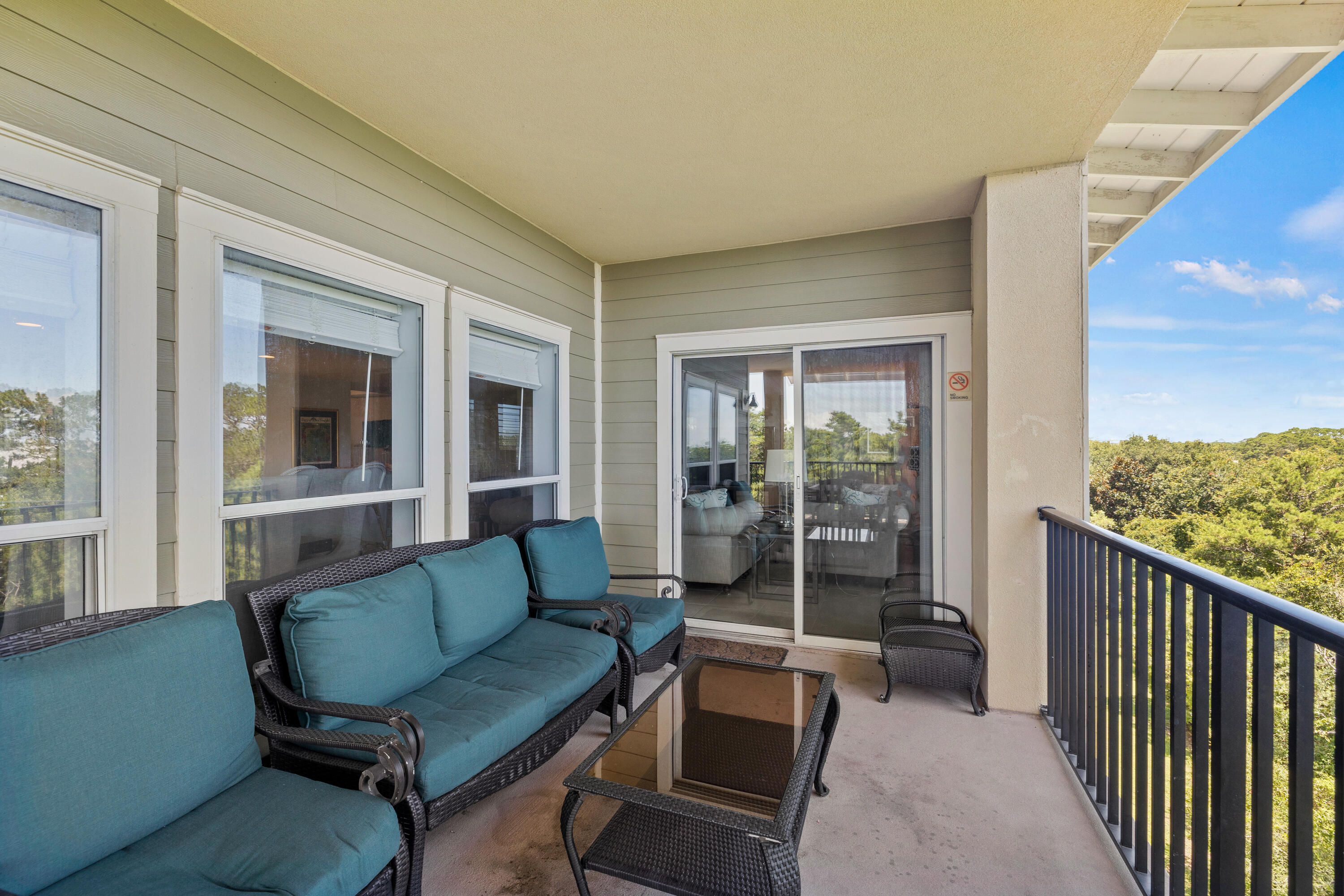 1732 West County Highway 30A, Unit 403R Santa Rosa Beach, FL 32459 - Photo 16 of 57 a living room with furniture and a large window