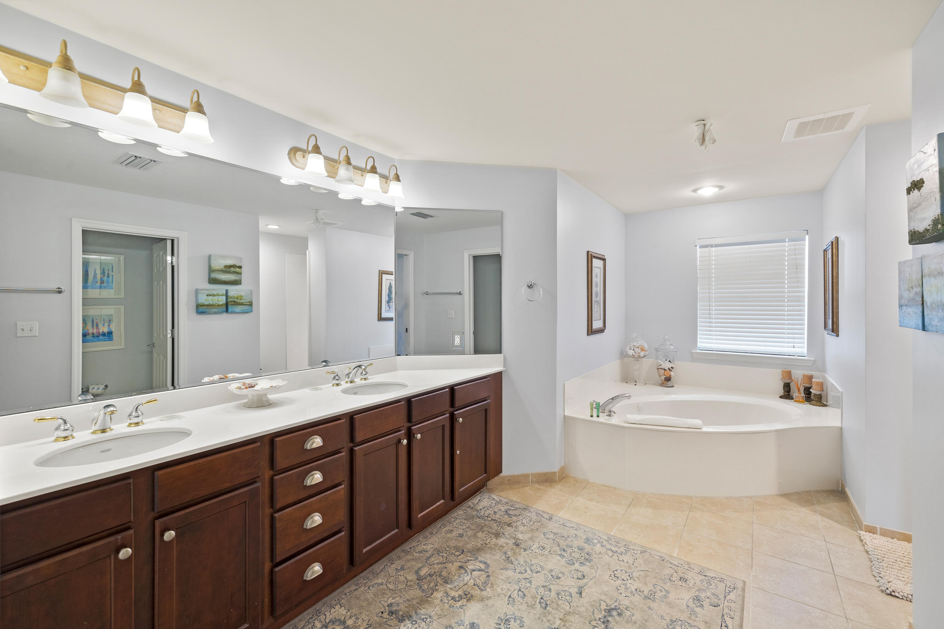 1732 West County Highway 30A, Unit 403R Santa Rosa Beach, FL 32459 - Photo 22 of 57 a spacious bathroom with a double vanity sink mirror and bathtub